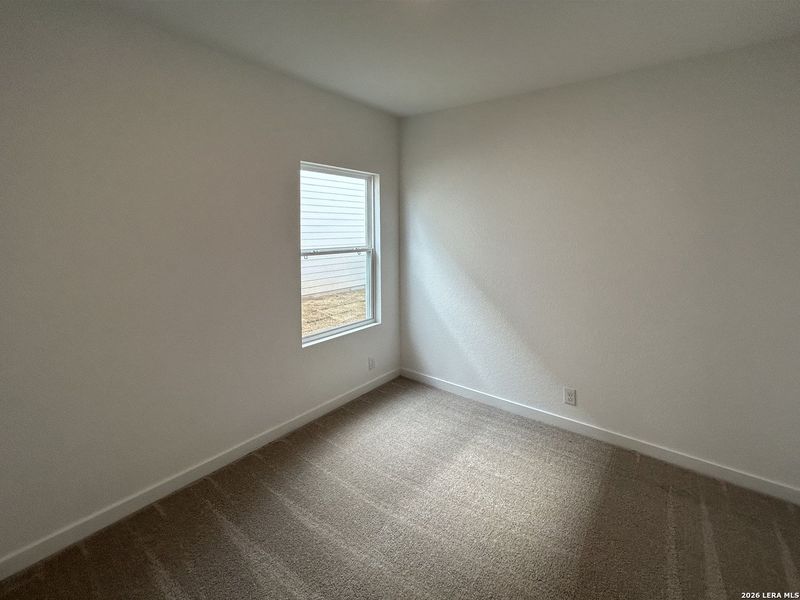 Spacious, unfurnished interior of a new home in Hennersby Hollow, San Antonio (Image 28).