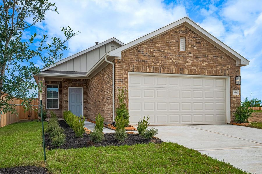 Front exterior of a new home in La Segarra, Brookshire, TX, highlighting curb appeal (Image 25).