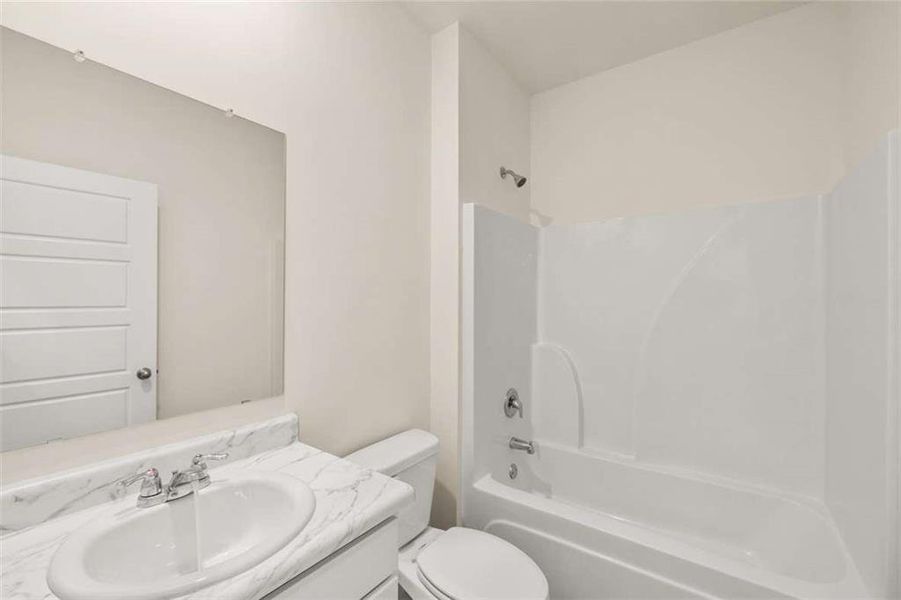 Furnished interior view inside a new home in Champion's Run, Lithonia (Image 7).