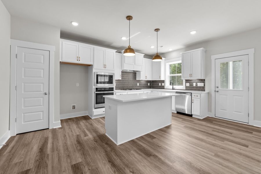 Representative furnished interior of a home built from the Happy by Garman Homes in Golden Gate, High Point (Image 4).