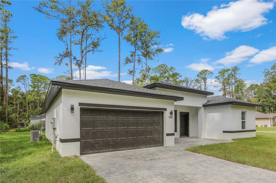 Front exterior of a new home in , Ocala, FL, highlighting curb appeal (Image 23). Front exterior of a new home in , Ocala, FL, highlighting curb appeal (Image 23).