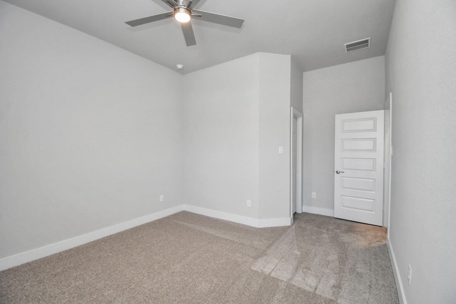 Generously sized secondary bedrooms featuring spacious closets, soft and inviting carpeting underfoot, large windows allowing plenty of natural light, and the added touch of privacy blinds for your personal retreat. Sample photo of completed home with similar floor plan. Actual colors and selections may vary. Generously sized secondary bedrooms featuring spacious closets, soft and inviting carpeting underfoot, large windows allowing plenty of natural light, and the added touch of privacy blinds for your personal retreat. Sample photo of completed home with similar floor plan. Actual colors and selections may vary.