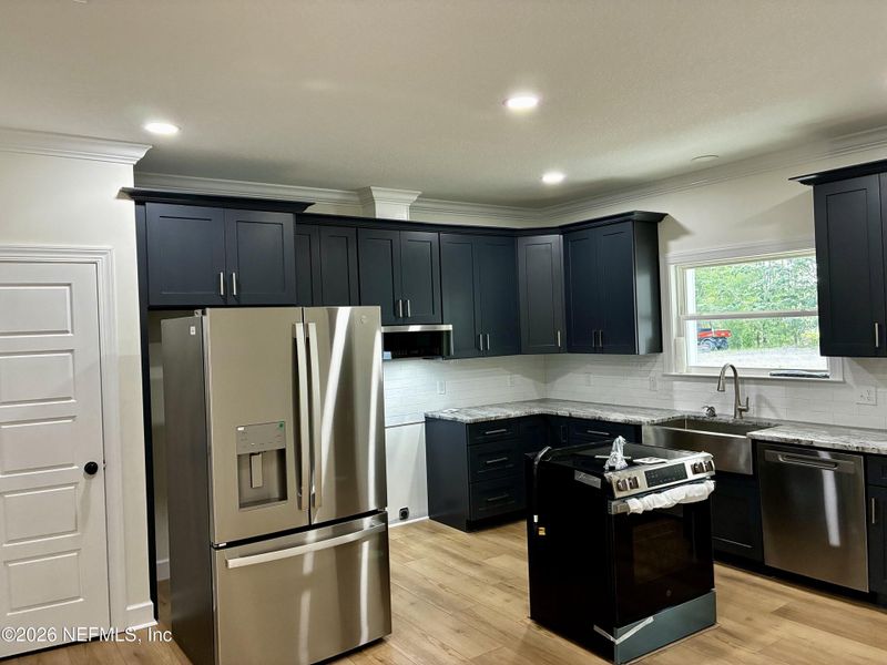 Furnished interior view inside a new home in , Glen St. Mary (Image 4).
