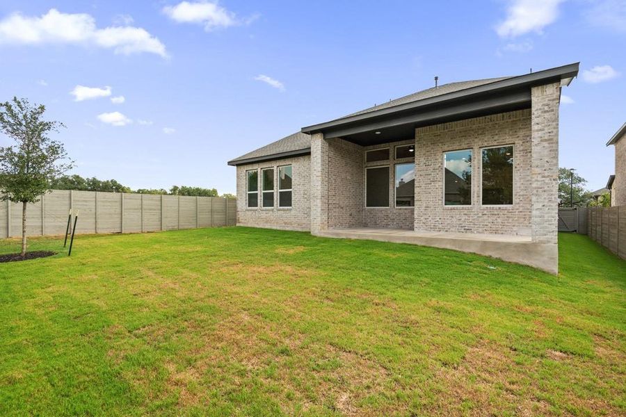Exterior details and patio area of a home in Wolf Ranch, Georgetown (Image 20).
