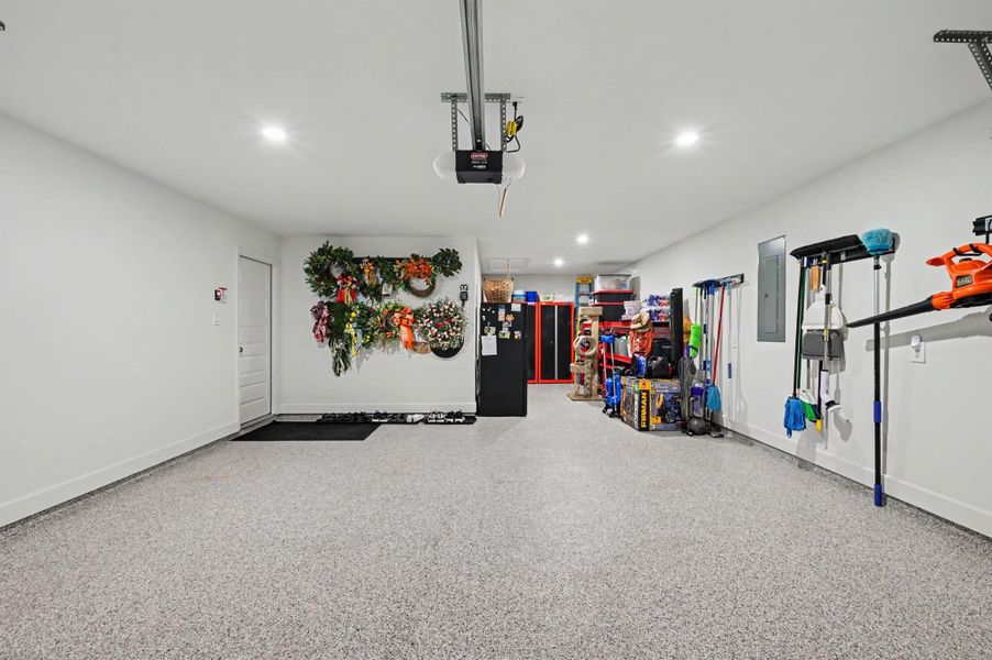 The garage is a tandem three-car and the floor has been painted with epoxy. Baseboards were added to finish out the garage and the attic has been floored for storage. The garage is a tandem three-car and the floor has been painted with epoxy. Baseboards were added to finish out the garage and the attic has been floored for storage.