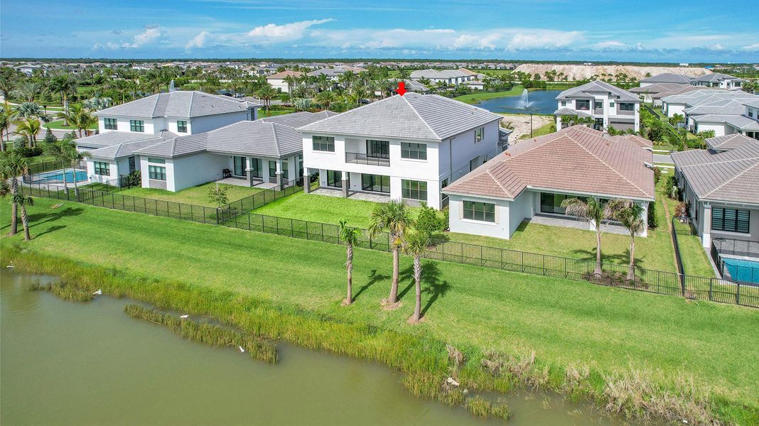 Front exterior of a new home in Apex at Avenir, Palm Beach Gardens, FL, highlighting curb appeal (Image 25).