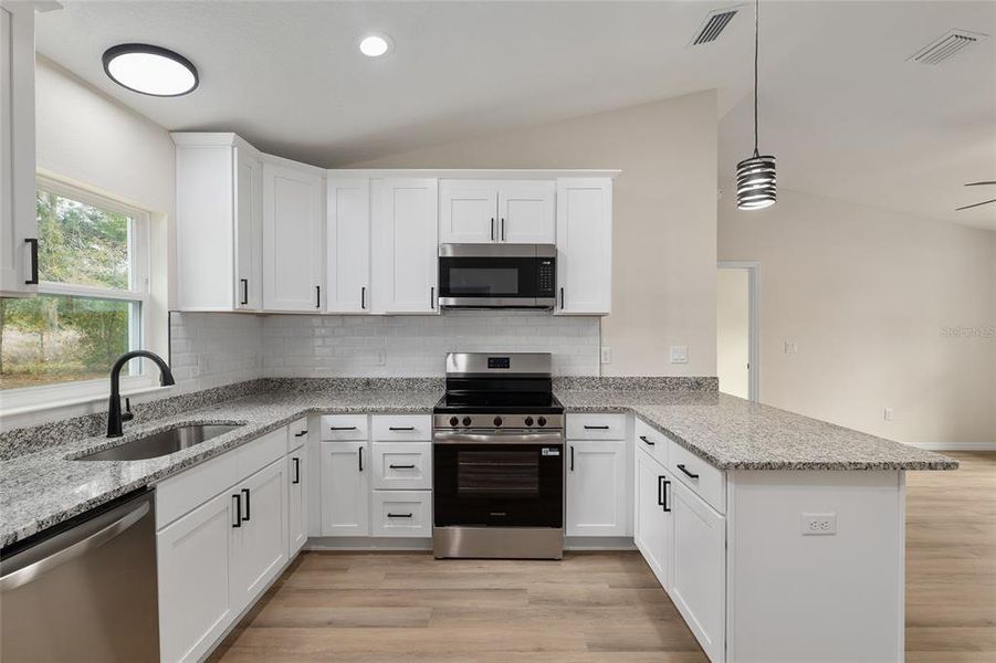 Furnished interior view inside a new home in , Dunnellon (Image 8).