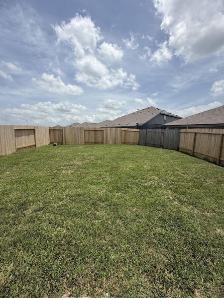 Exterior details and patio area of a home in Sweetgrass Village, Crosby (Image 26).