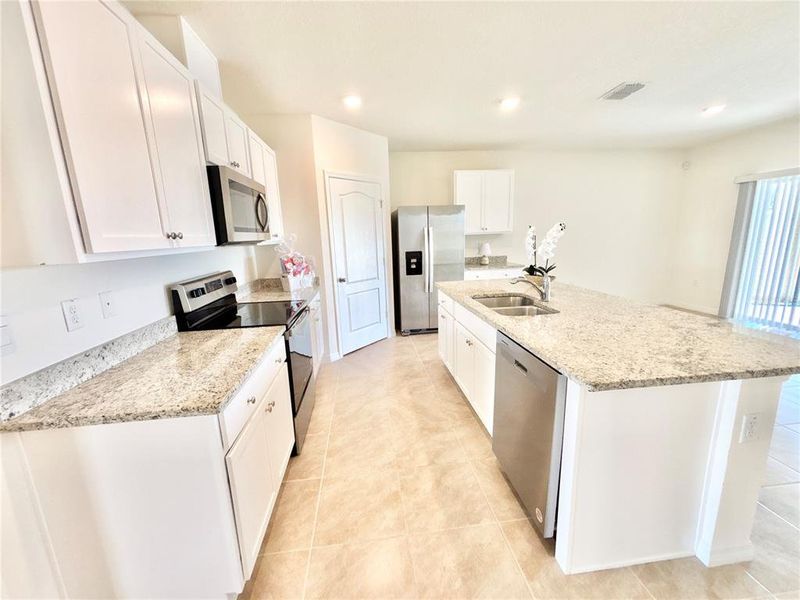 Furnished interior view inside a new home in Cascades, Davenport (Image 5).