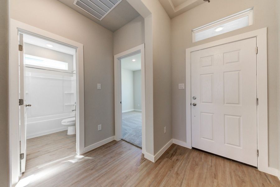 Representative unfurnished interior of a home built from the Sophora by Hakes Brothers in Hickory Ridge Estates, Elmendorf (Image 23). Representative unfurnished interior of a home built from the Sophora by Hakes Brothers in Hickory Ridge Estates, Elmendorf (Image 23).