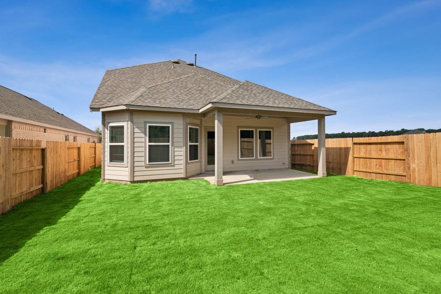 Exterior details and patio area of a home in Sorella, Tomball (Image 1).
