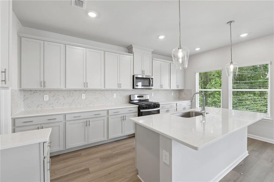 Furnished interior view inside a new home in Martin Springs - Estate Series, Lawrenceville (Image 8).