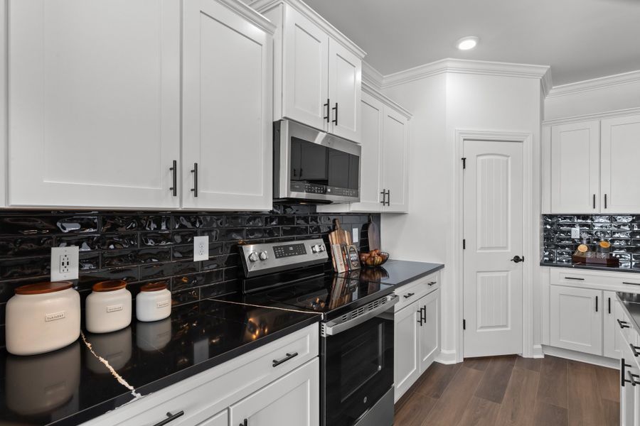 Representative furnished interior of a home built from the The Redbud by Chesapeake Homes in Neill's Pointe, Angier (Image 9).