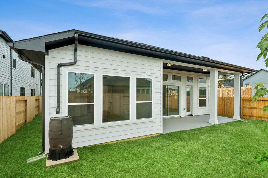 Exterior details and patio area of a home in ARTAVIA 50' Homesites, Conroe (Image 4).