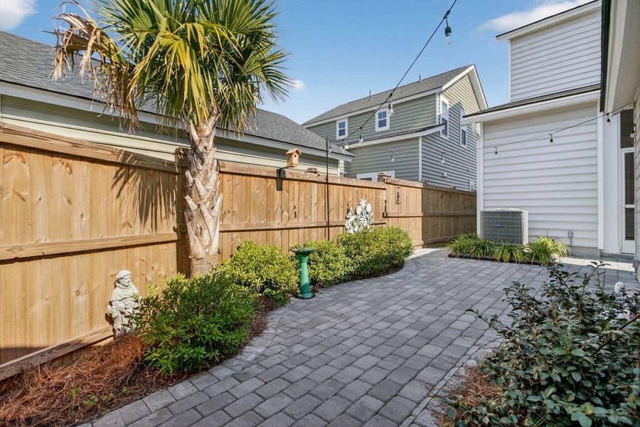 Exterior details and patio area of a home in Sweetgrass at Summers Corner, Summerville (Image 29).