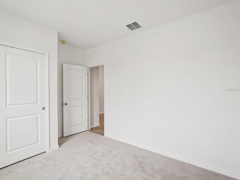 Spacious, unfurnished interior of a new home in Magnolia Bay - Classic Series, Nokomis (Image 9).