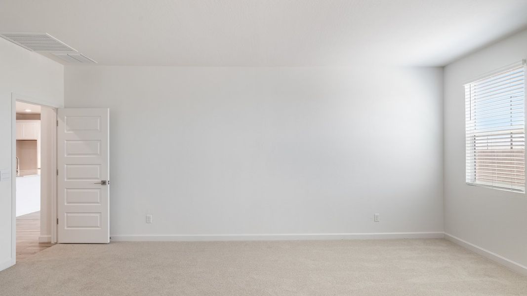 Spacious, unfurnished interior of a new home in Zanjero Pass, Waddell (Image 38).