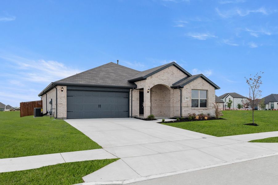 Front exterior of a new home in Terra Vella, Haslet, TX, highlighting curb appeal (Image 2). Front exterior of a new home in Terra Vella, Haslet, TX, highlighting curb appeal (Image 2).
