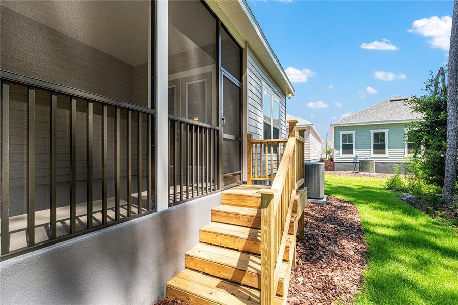 Front exterior of a new home in Fairway Pointe at West End, Newberry, FL, highlighting curb appeal (Image 31). Front exterior of a new home in Fairway Pointe at West End, Newberry, FL, highlighting curb appeal (Image 31).