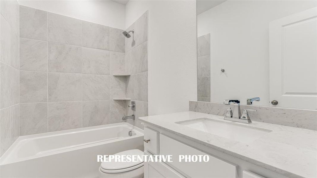 Guests will feel right at home in any of the beautifully finished guest baths.  REPRESENTATIVE PHOTO.