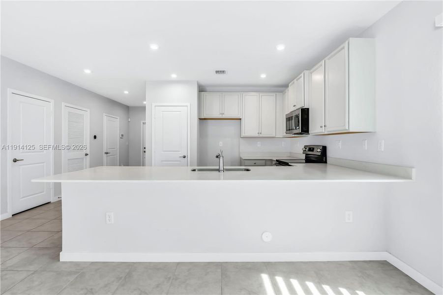 Furnished interior view inside a new home in , Florida City (Image 7).