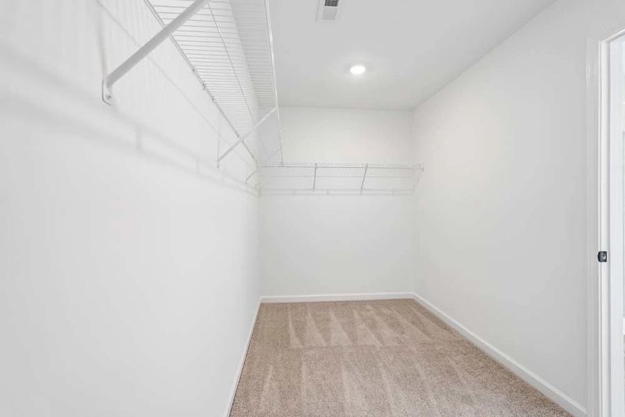 Representative Photo: Primary Bedroom Walk-In Closet Representative Photo: Primary Bedroom Walk-In Closet