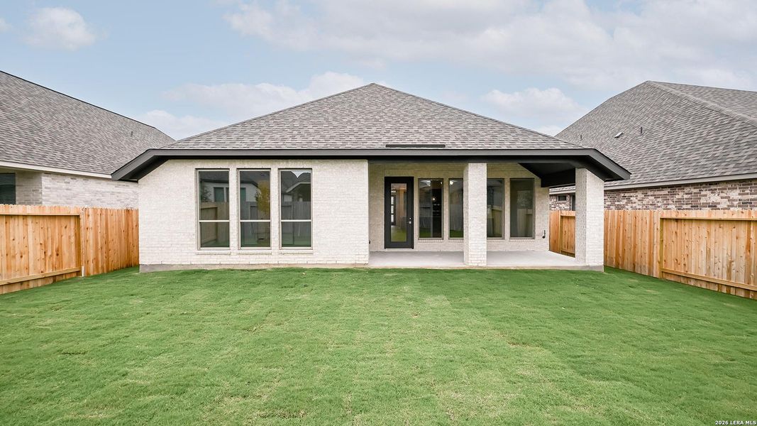 Exterior details and patio area of a home in Meadows of Mill Creek, Seguin (Image 4).