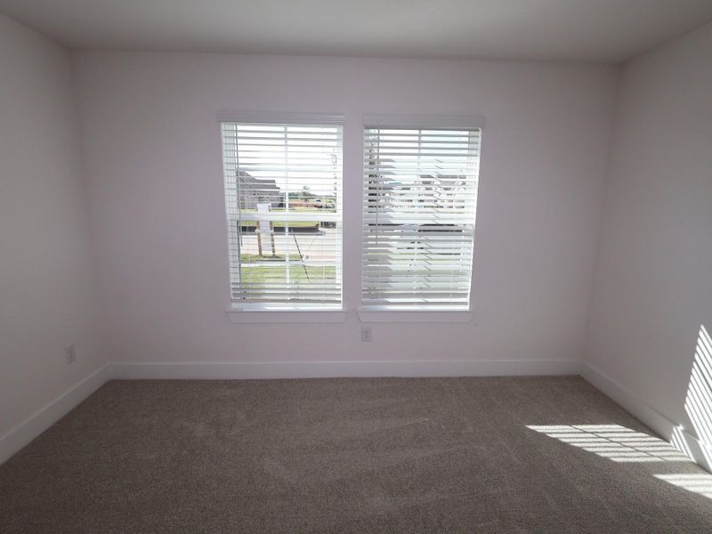Spacious, unfurnished interior of a new home in Hallimore Ranch, Rosenberg (Image 26).