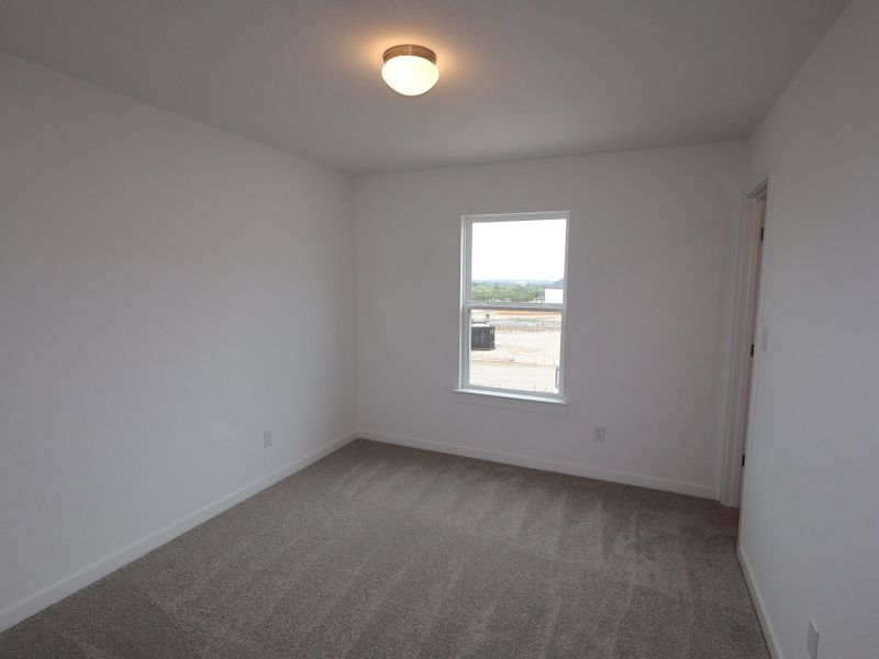 Spacious, unfurnished interior of a new home in Heritage, Dripping Springs (Image 6).