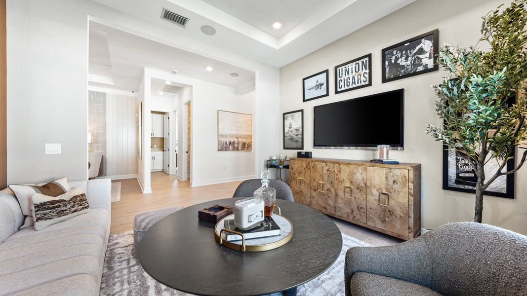 Furnished interior view inside a new home in Esplanade by the Islands, Naples (Image 7).