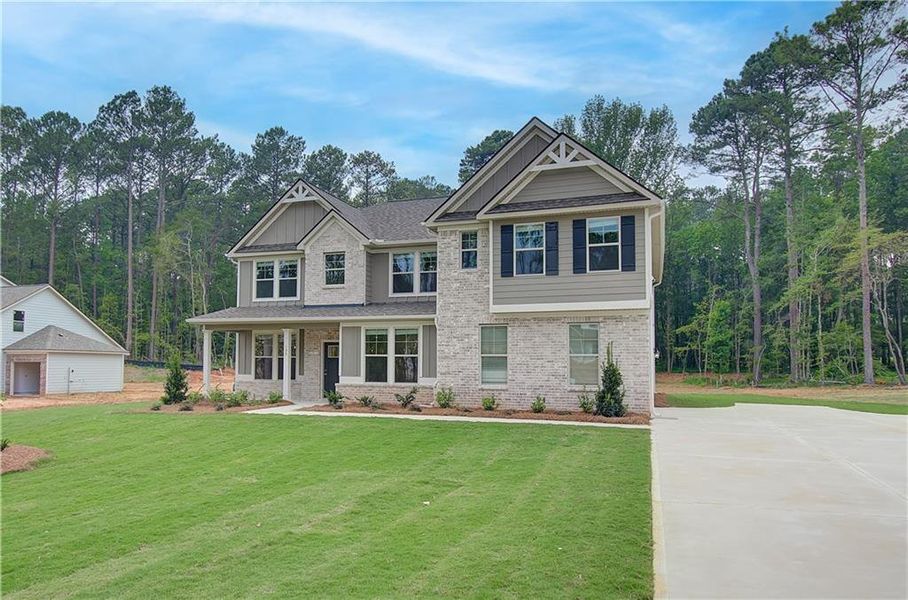 Front exterior of a new home in Riverbend Overlook, Fayetteville, GA, highlighting curb appeal (Image 14).
