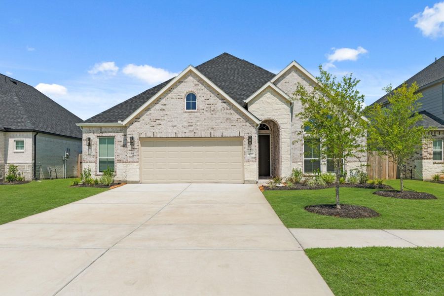 Front exterior of a new home in Briarwood Crossing, Rosenberg, TX, highlighting curb appeal (Image 23).