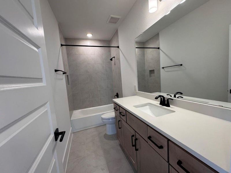 Furnished interior view inside a new home in Easthaven at Bridgeland Central - Vision Collection, Cypress (Image 8).