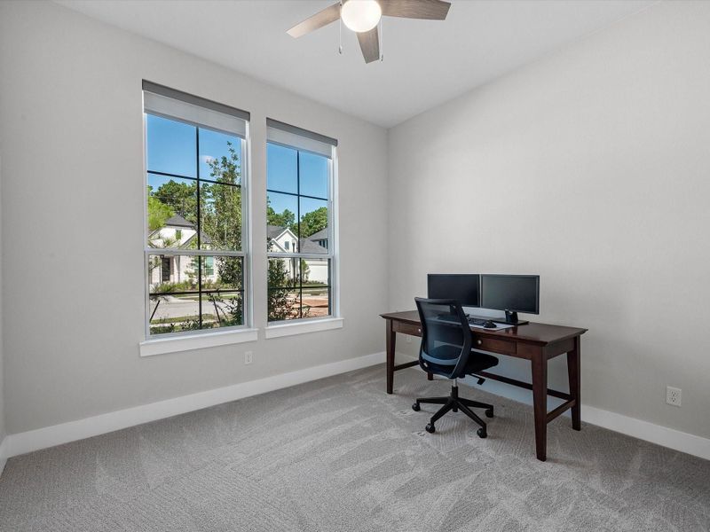 This is the front bedroom, hosting a closet and access to full bath #2 on first floor. Ideal for home office or downstairs suite. This is the front bedroom, hosting a closet and access to full bath #2 on first floor. Ideal for home office or downstairs suite.