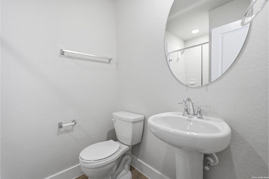 Furnished interior view inside a new home in The Woodlands at Medina Hills, Mico (Image 10).