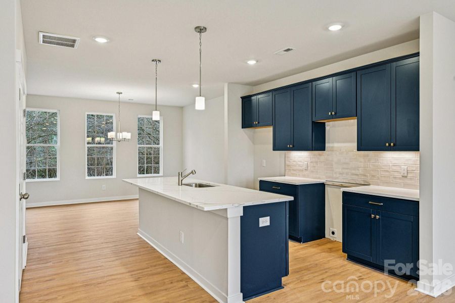 Furnished interior view inside a new home in Vanguard at Vermillion, Huntersville (Image 12).