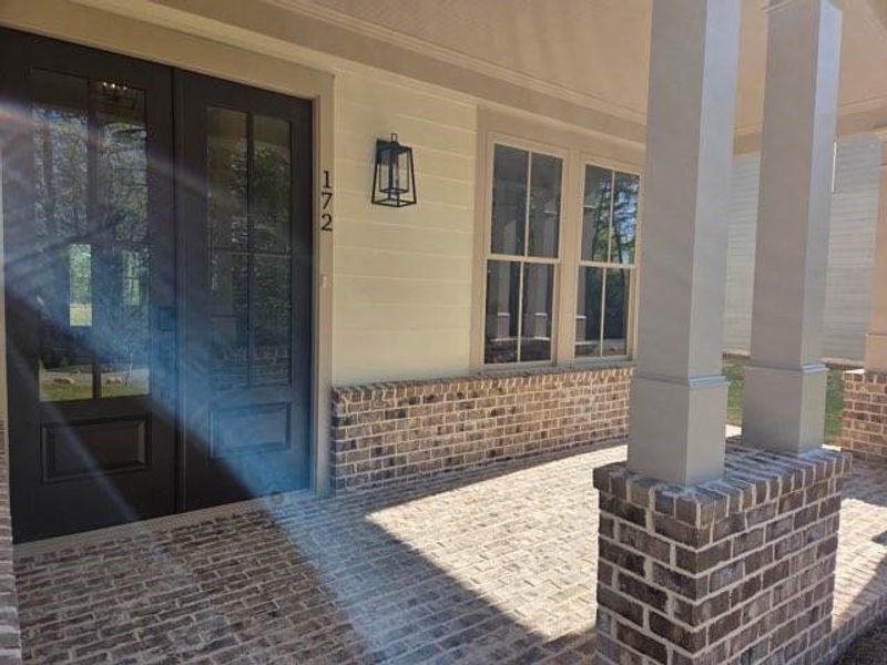 Exterior details and patio area of a home in , Waleska (Image 3).