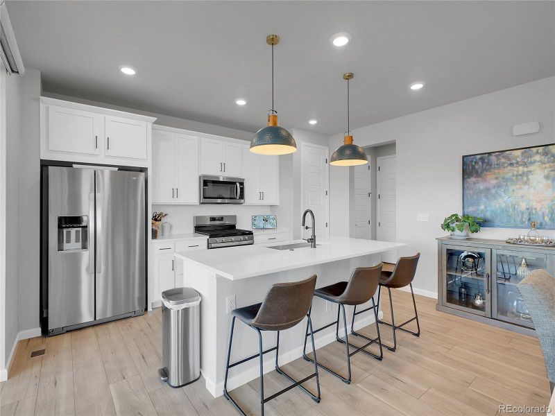 Furnished interior view inside a new home in Wild Oak at The Canyons, Castle Pines (Image 4). Furnished interior view inside a new home in Wild Oak at The Canyons, Castle Pines (Image 4).