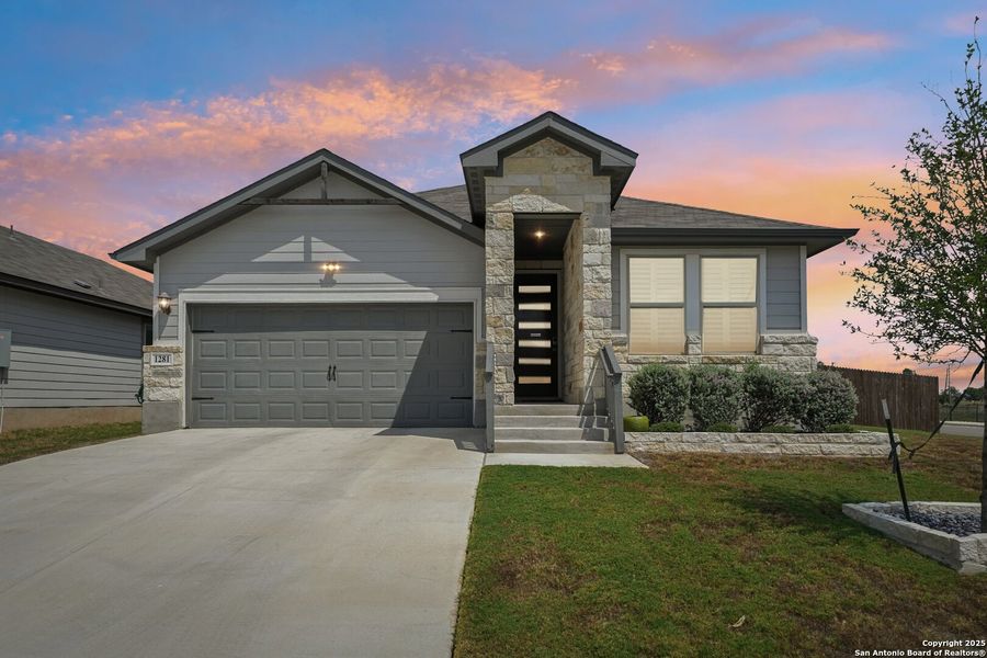 Front exterior of a new home in Meyers Landing, New Braunfels, TX, highlighting curb appeal (Image 2).