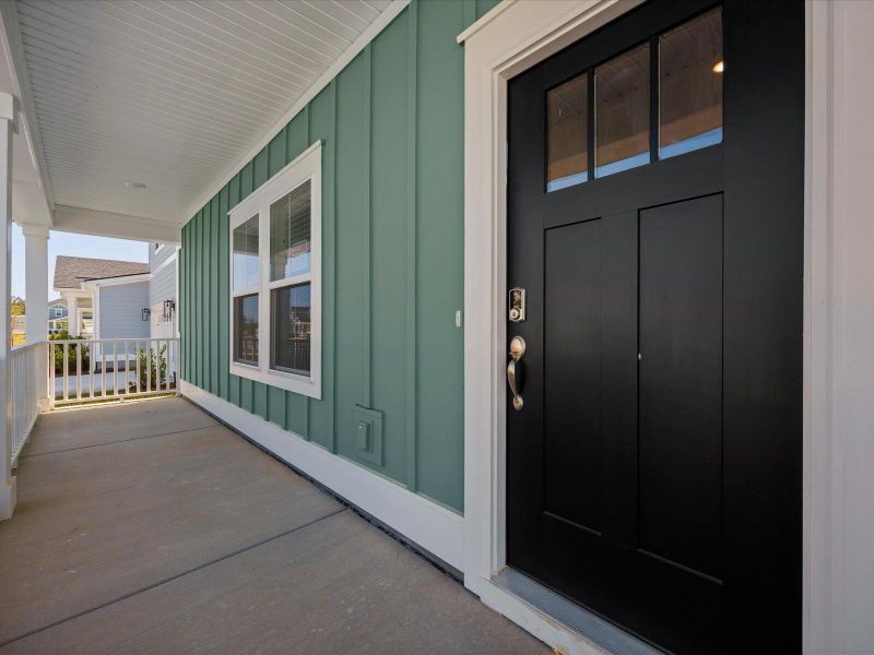 Exterior details and patio area of a home in The Coves at Lakes of Cane Bay II, Summerville (Image 3). Exterior details and patio area of a home in The Coves at Lakes of Cane Bay II, Summerville (Image 3).