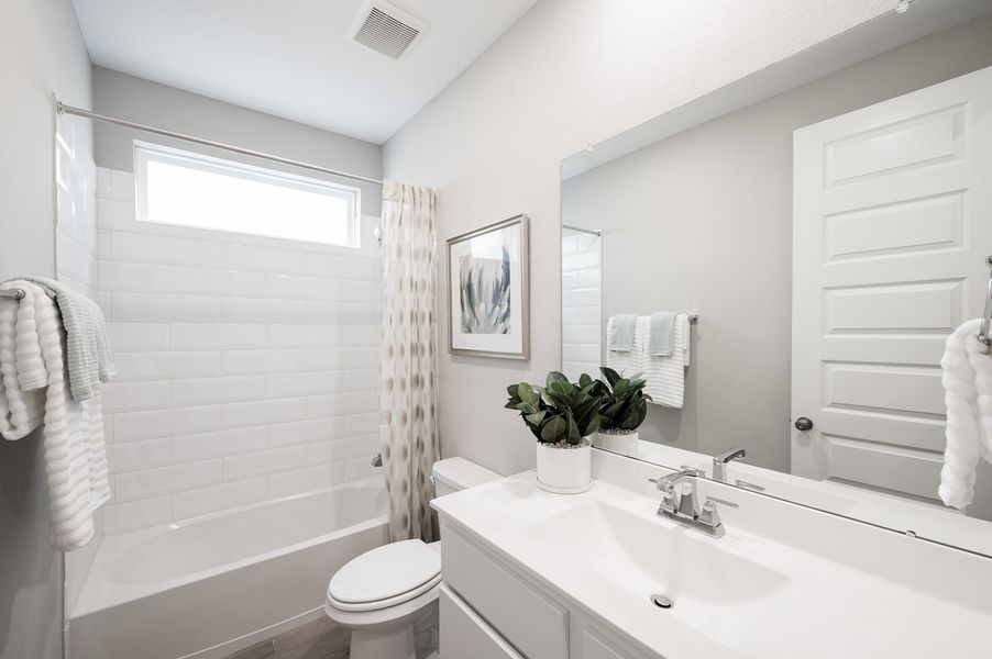 Representative furnished interior of a home built from the Verdin by Tri Pointe Homes in Pecan Ridge, Fulshear (Image 38).