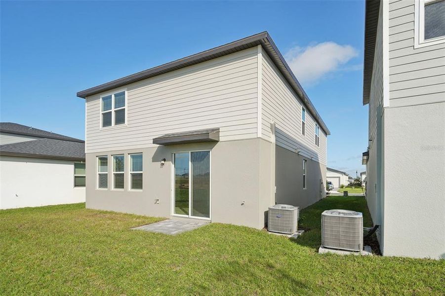 Exterior details and patio area of a home in Crosswinds - Classic Series, Haines City (Image 17).