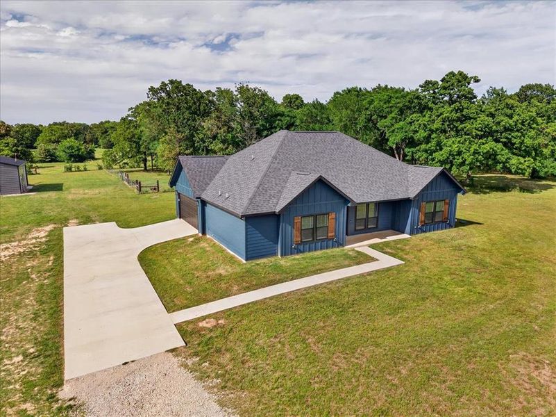 Front exterior of a new home in , Athens, TX, highlighting curb appeal (Image 19).