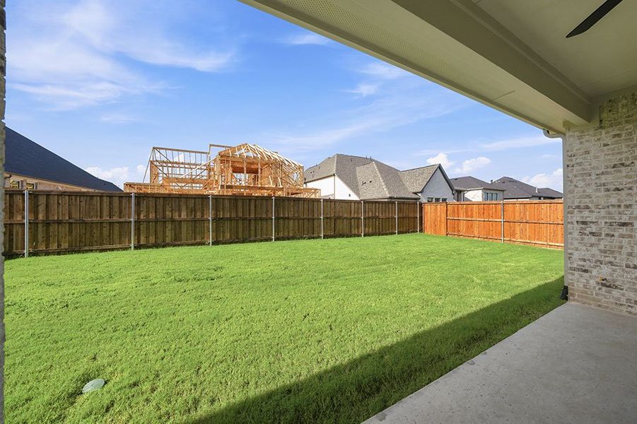 Exterior details and patio area of a home in The Homestead - 62', Rockwall (Image 3).