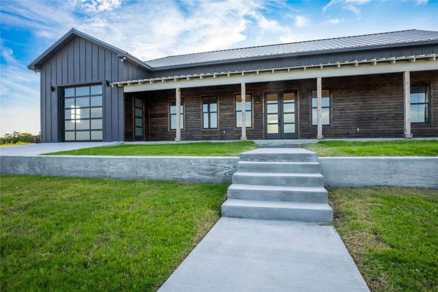 Front exterior of a new home in , Lampasas, TX, highlighting curb appeal (Image 2).
