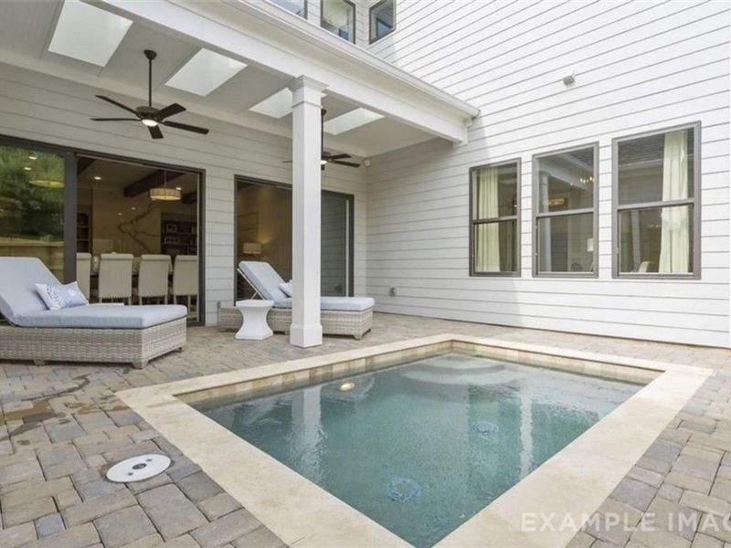 Exterior details and patio area of a home in The Village at Towne Lake, Woodstock (Image 26).