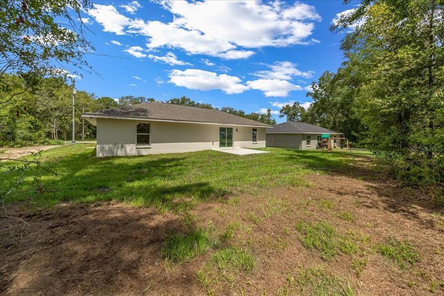 Exterior details and patio area of a home in , Belleview (Image 4).