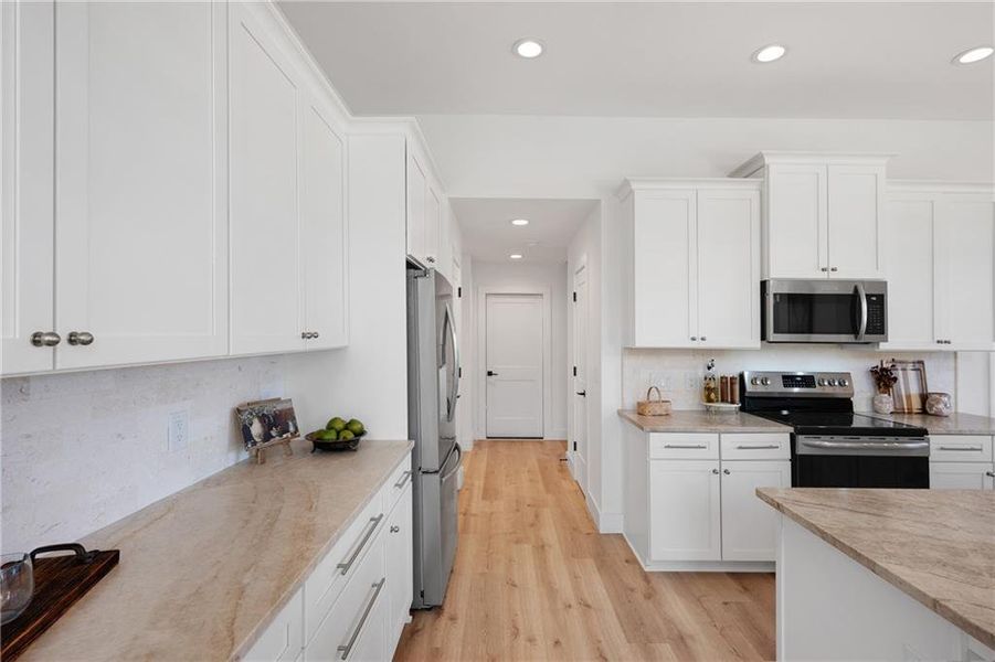 Furnished interior view inside a new home in , Taylorsville (Image 7). Furnished interior view inside a new home in , Taylorsville (Image 7).