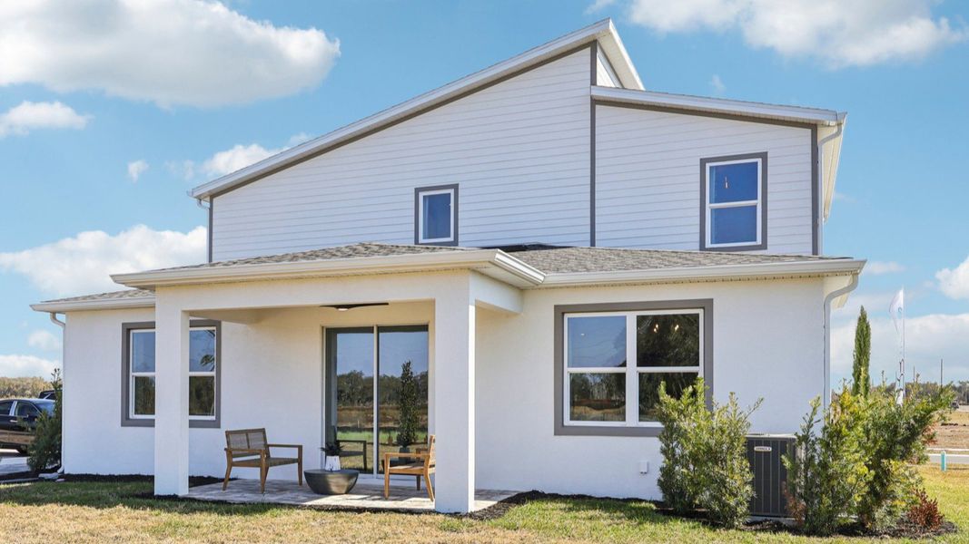 The Mangrove Model Rear Exterior in Modern Elevation at Lakeside at Satilla by DRB Homes in Saint Cloud, FL