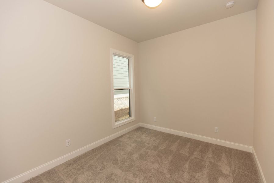 Representative unfurnished interior of a home built from the The Tensley by The Providence Group in Waterhaven, Cumming (Image 29).